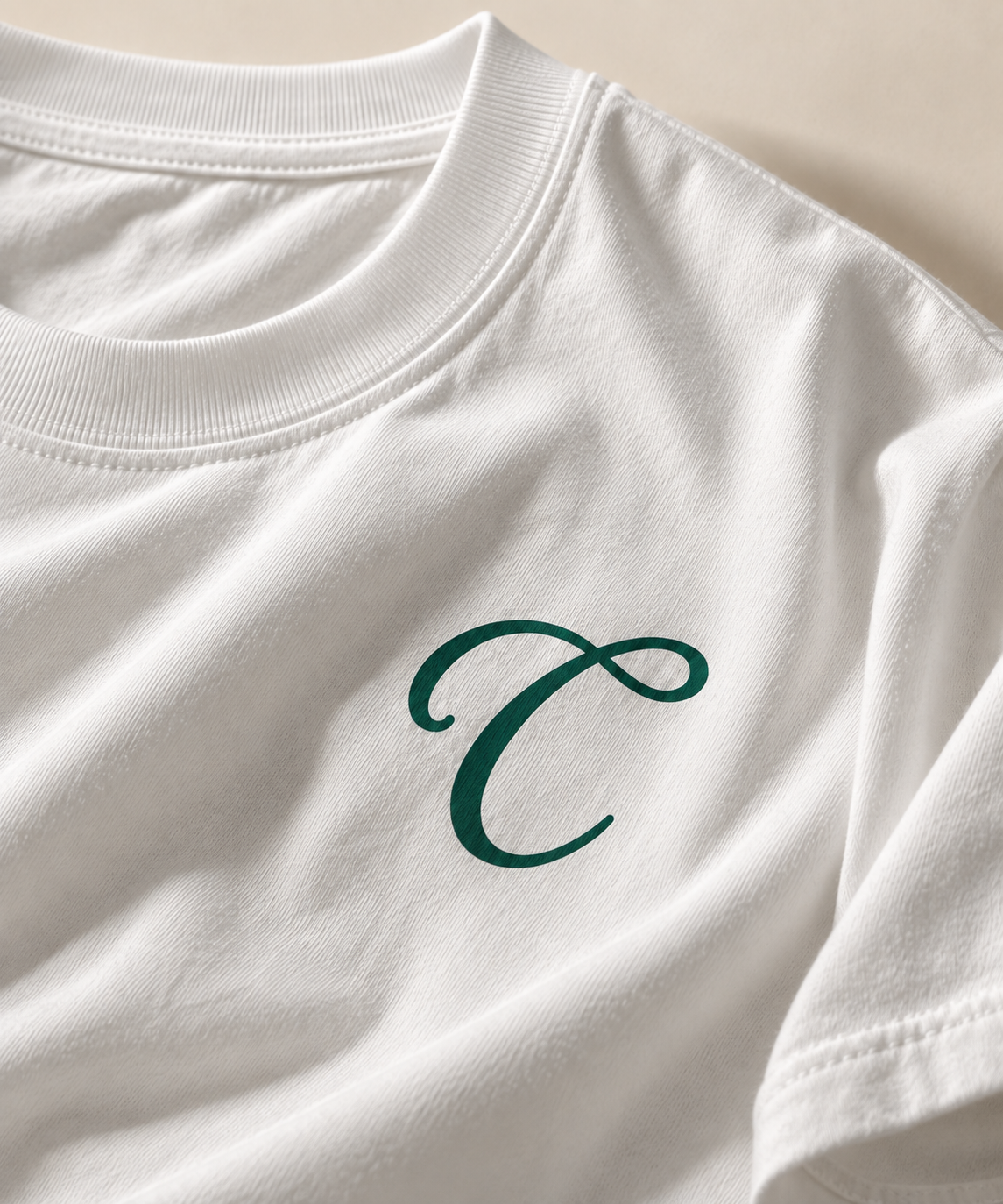 Close-up: White San Diego Tee close-up – Caston C chest mark